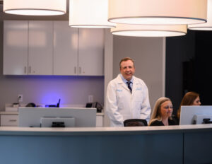 dr zeni and staff at front desk